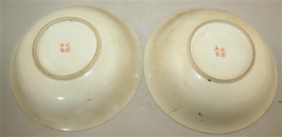 A pair of Chinese enamelled porcelain nine dragon bowls, Republic period, 21cm